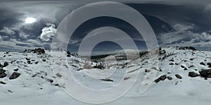 UHD 4K 360 VR of snowy mount top. The sunlight on the peak and ice landscape. Winter frozen rocks