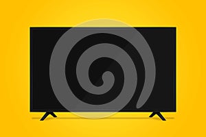 uhd smart tv on yellow background photo