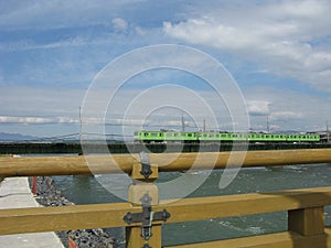 Uji Bashi Bridge runs across the Uji-gawa River in Uji City of Kyoto