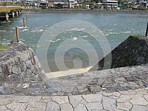 Uji Bashi Bridge runs across the Uji-gawa River in Uji City of Kyoto