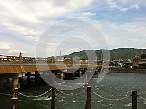 Uji Bashi Bridge runs across the Uji-gawa River in Uji City of Kyoto