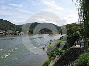 Uji Bashi Bridge runs across the Uji-gawa River in Uji City of Kyoto