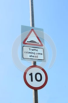 UK 10 mph speed limit and traffic calming speed bumps signs