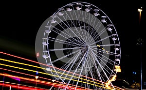 UK. Bournemouth Big Wheel with light trail. Ferris wheel near Bournemouth Pier, photographed at night.