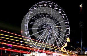 UK. Bournemouth Big Wheel with light trail. Ferris wheel near Bournemouth Pier, photographed at night.