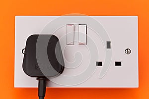 UK electrical wall socket outlet and plug photo