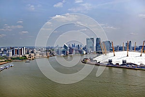 UK, England, London, 02 Arena and Canary Wharf Skyline