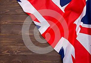 UK flag on wooden background. The place to advertise, template.