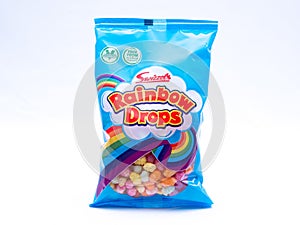 UK, Jan 2020: Swizzels rainbow drops sweets on white background