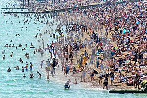 UK June 29th, 2019 Brighton beach, Brighton and Hove, East Sussex, England. Thousands of people relax on the sun
