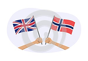 UK and Norway flags. Norwegian and British national symbols. Hand holding waving flag. Vector illustration