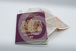 UK passport with cash