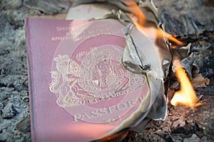 UK passport on fire