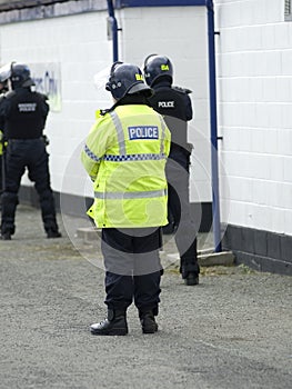 Uk Police Officers in Riot Gear photo