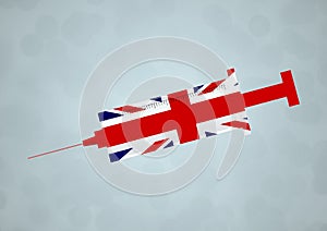 A UK Union Jack Flag syringe illustration to symbolise the vaccination of the United Kingdom of Great Britain and Northern Ireland