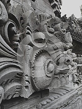 The ukiran BOME is one of the caracter in Balis Hindu which they build in every balinese house photo