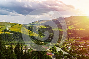 Ukraine, Carpathians. View of the Verkhovyna village from the lookout mountain Shveykova