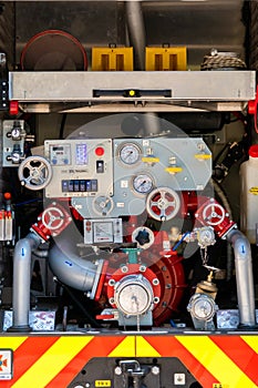 Ukraine, Cherkasy - June 1, 2023:Modern fire engine. Rear view of valves with hydrants