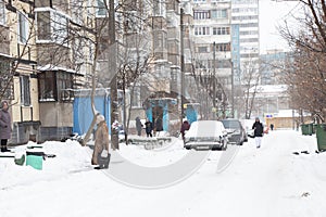 Ukraine Dnipro 01.13.2021 - snow fell in a residential area of the city of Dnipro, townspeople on the streets