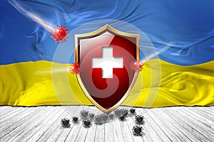 Ukraine flag with Metal Shiny red shield. virus protection, hygiene shield. virus Vaccine Protection aganst coronavirus, Health