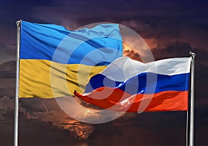 Ukraine Flag on Urss Russia Flag with storm sky in background