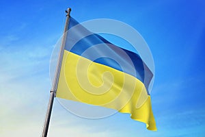 Ukraine flag waving on the blue sky 3D illustration