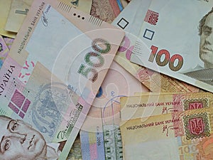 Ukraine grivna cash on background.