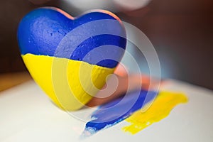 Ukraine Heart with drawn Ukraine flag. Love and respect Ukraine. The concept of Ukrainian patriotism and pride
