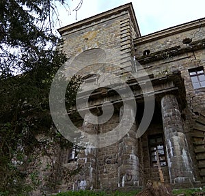 Ukraine, Khmilnyk, the palace of Count Xido, part of the facade of the palace on the river side photo