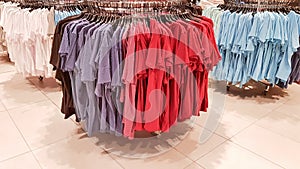 Ukraine, Kiev - September 04, 2019: A large clothing store, mannequins and many rows with hangers, a variety of sizes and colors.