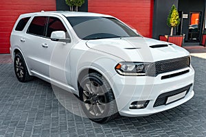 Ukraine, Odessa July 8 - 2021: White Dodge Durango in the park.