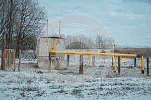 Ukraine, old ancient classical Soviet oil pumps at winter