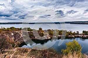 Ukraine. Old Kodax. Granite quarry flooded with water. Dnieper River.