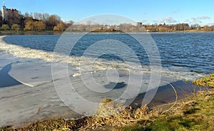 Ukraine, Prykarpattia, Dolyna, ice melting on the lake in sunny weather