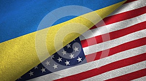 Ukraine and United States two flags textile cloth, fabric texture