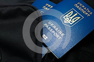 Ukrainian biometric passport id to travel the Europe without visas on the backpack. Inscription in Ukrainian