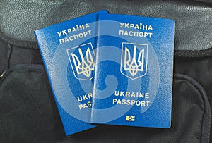 Ukrainian biometric passport id to travel the Europe without visas on the backpack. Inscription in Ukrainian