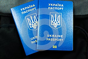 Ukrainian biometric passport id to travel the Europe without visas on the backpack. Inscription in Ukrainian