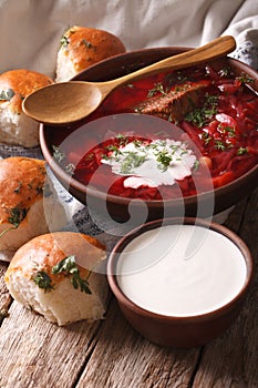 Ukrainian borsch soup with vegetables and meat close up. vertical