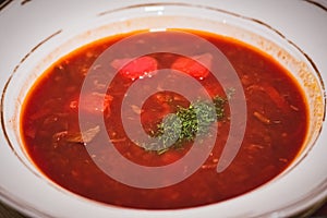 Ukrainian Borscht is a sour soup, made with meat stock, vegetables and seasonings