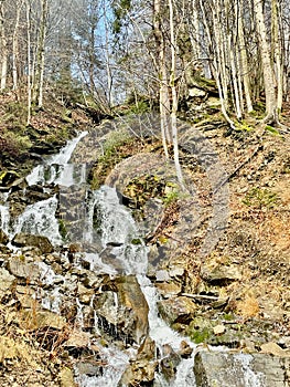 Ukrainian Carpathians mountainous area on a sunny cold day with various water bodies