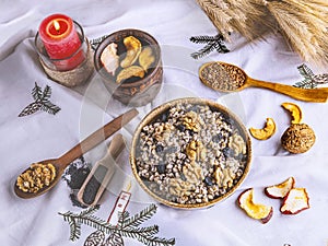 Ukrainian Christmas dish kutia, wheat porridge with nuts, poppy seeds, raisins.