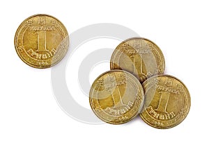 Ukrainian copper metal coin, one and three hryvnia, on a white background, top view