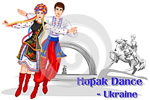 Ukrainian Couple performing Hopak Dance of Ukraine photo