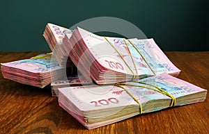 Ukrainian currency hryvnia UAH on the desk