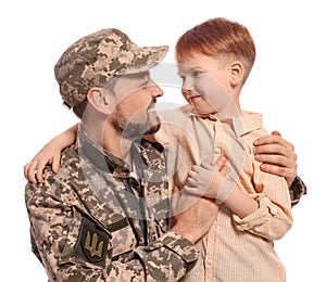 Ukrainian defender in military uniform with his little son on white background