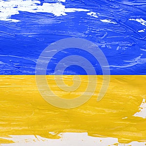 Ukrainian flag background painted using yellow and blue gouache