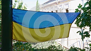 Ukrainian flag on of the house.