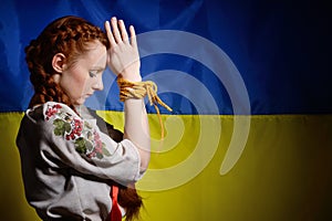 Ukrainian girl with hands tied