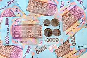 Ukrainian hryvnia, 1000 grivna banknotes and coins money background, shopping Ukraine